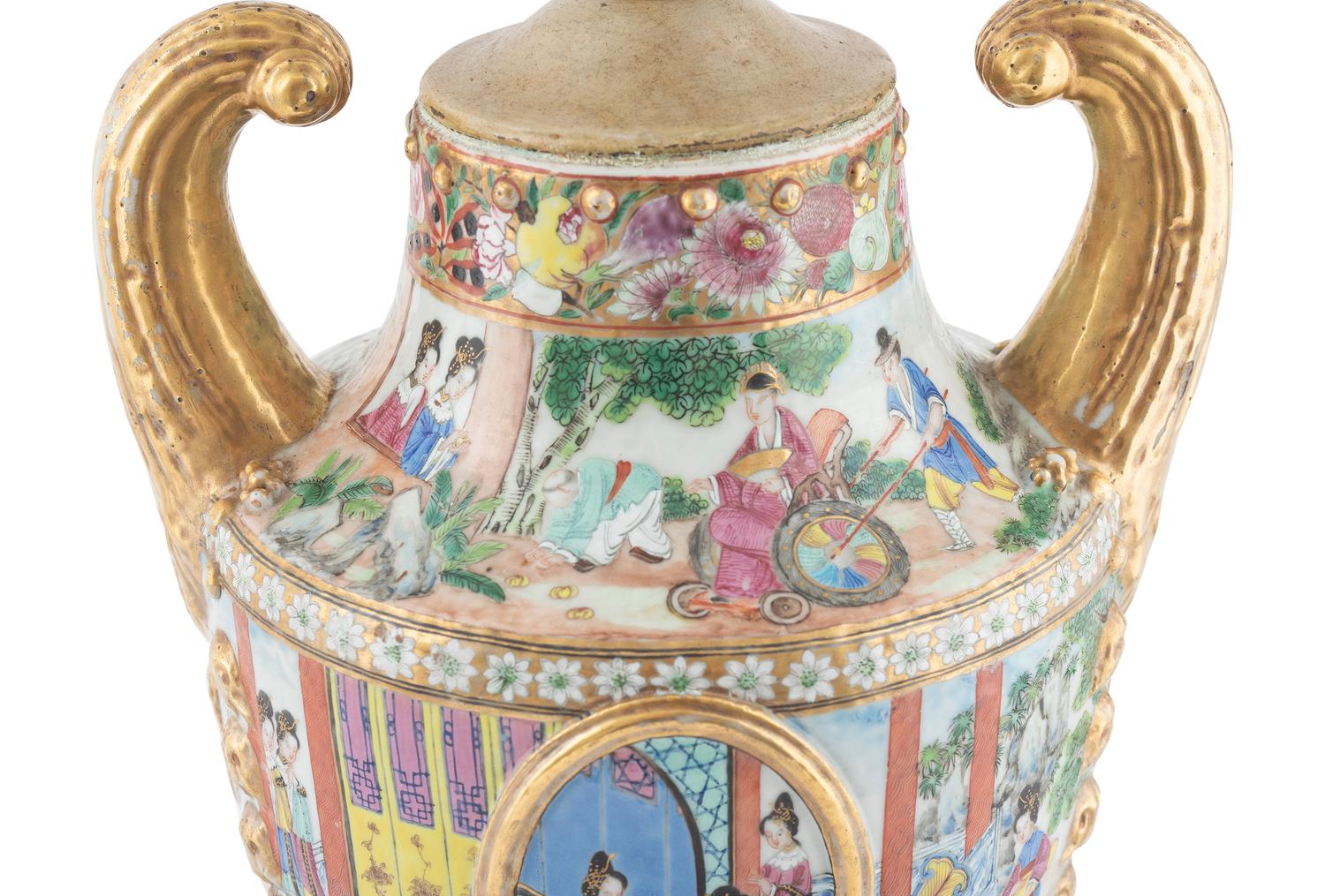 A Chinese Export Parcel Gilt Decorated Famille Rose Porcelain Pistol-Handled Urn