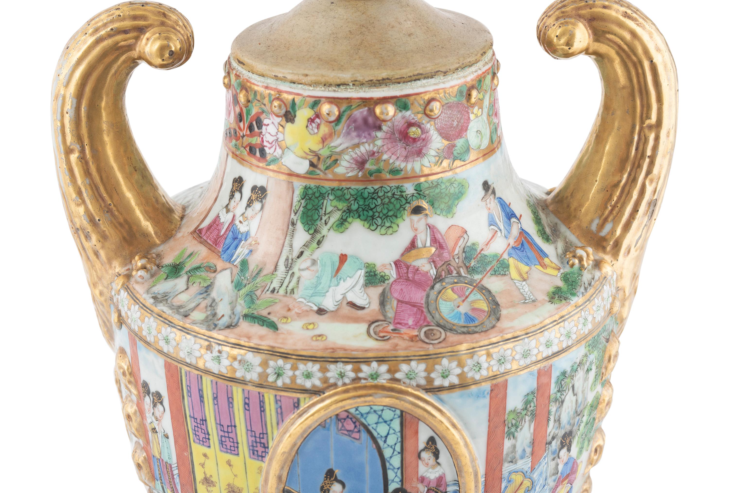 A Chinese Export Parcel Gilt Decorated Famille Rose Porcelain Pistol-Handled Urn