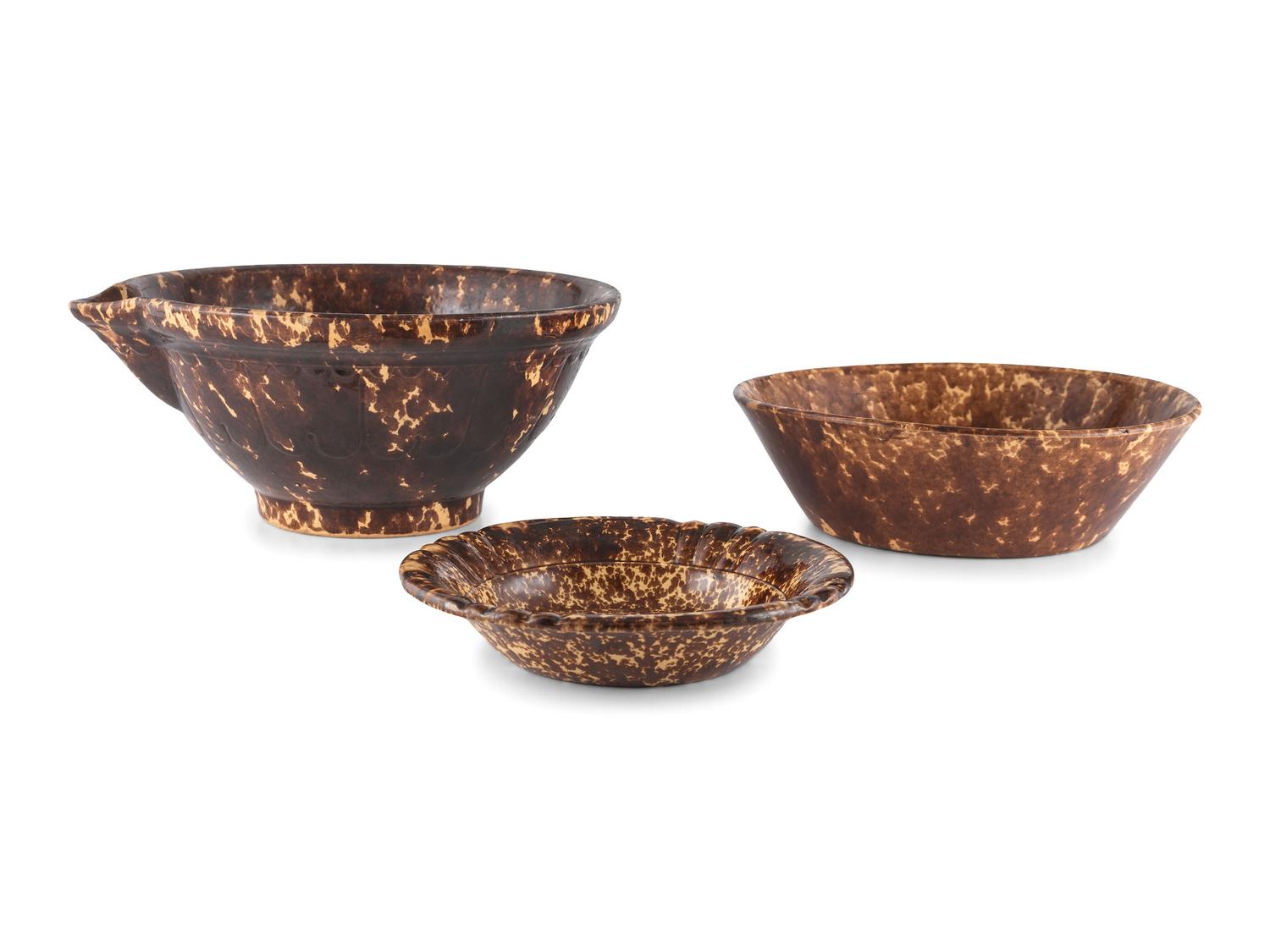 A Group of Rockingham Glaze Bowls and Molds