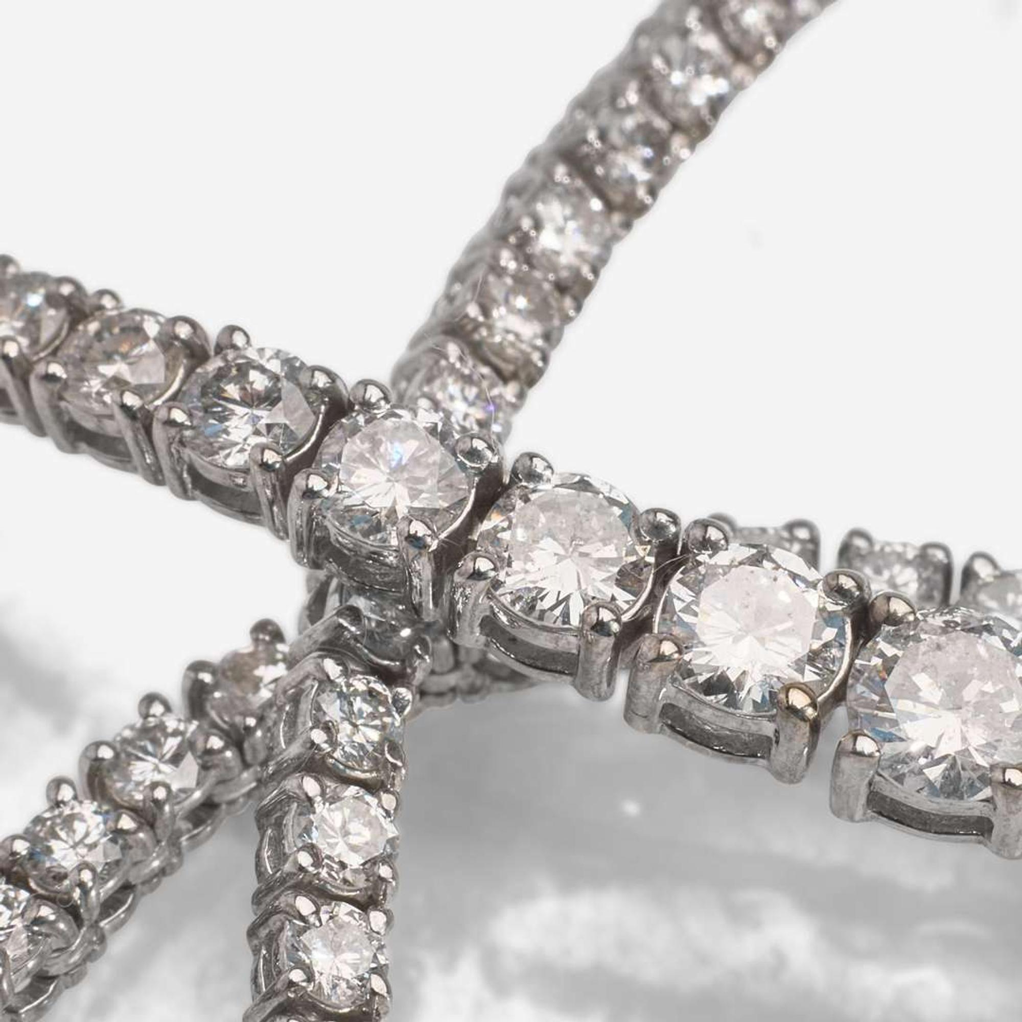 A Diamond and 18K White Gold Rivière Style Necklace
