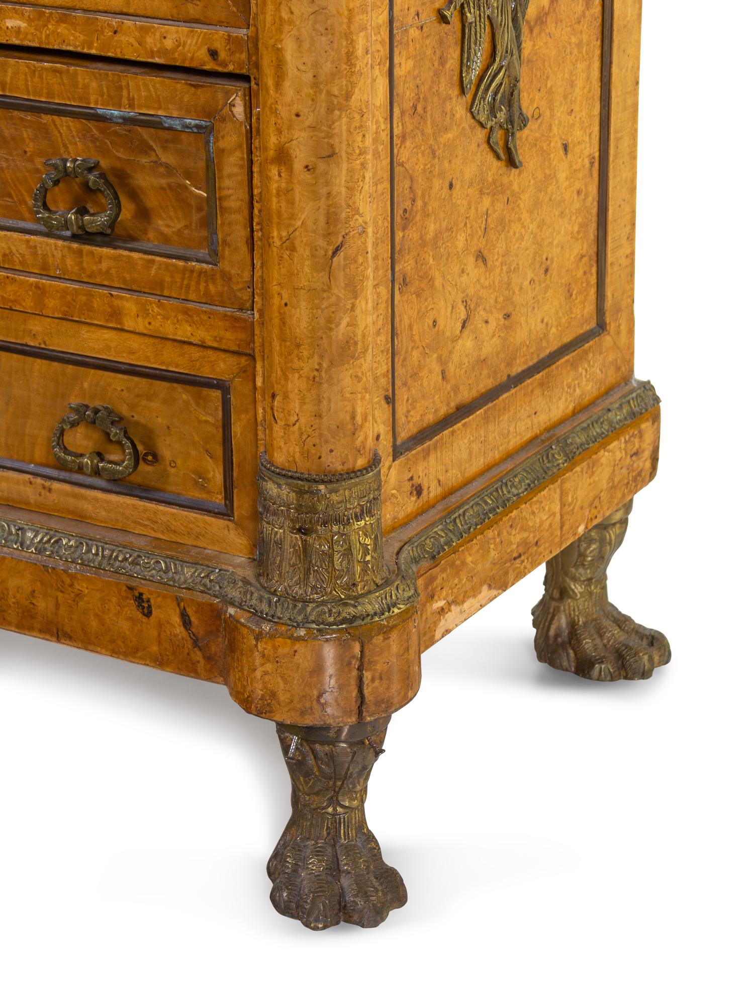An Empire Style Gilt Metal Mounted Burlwood Chest of Drawers