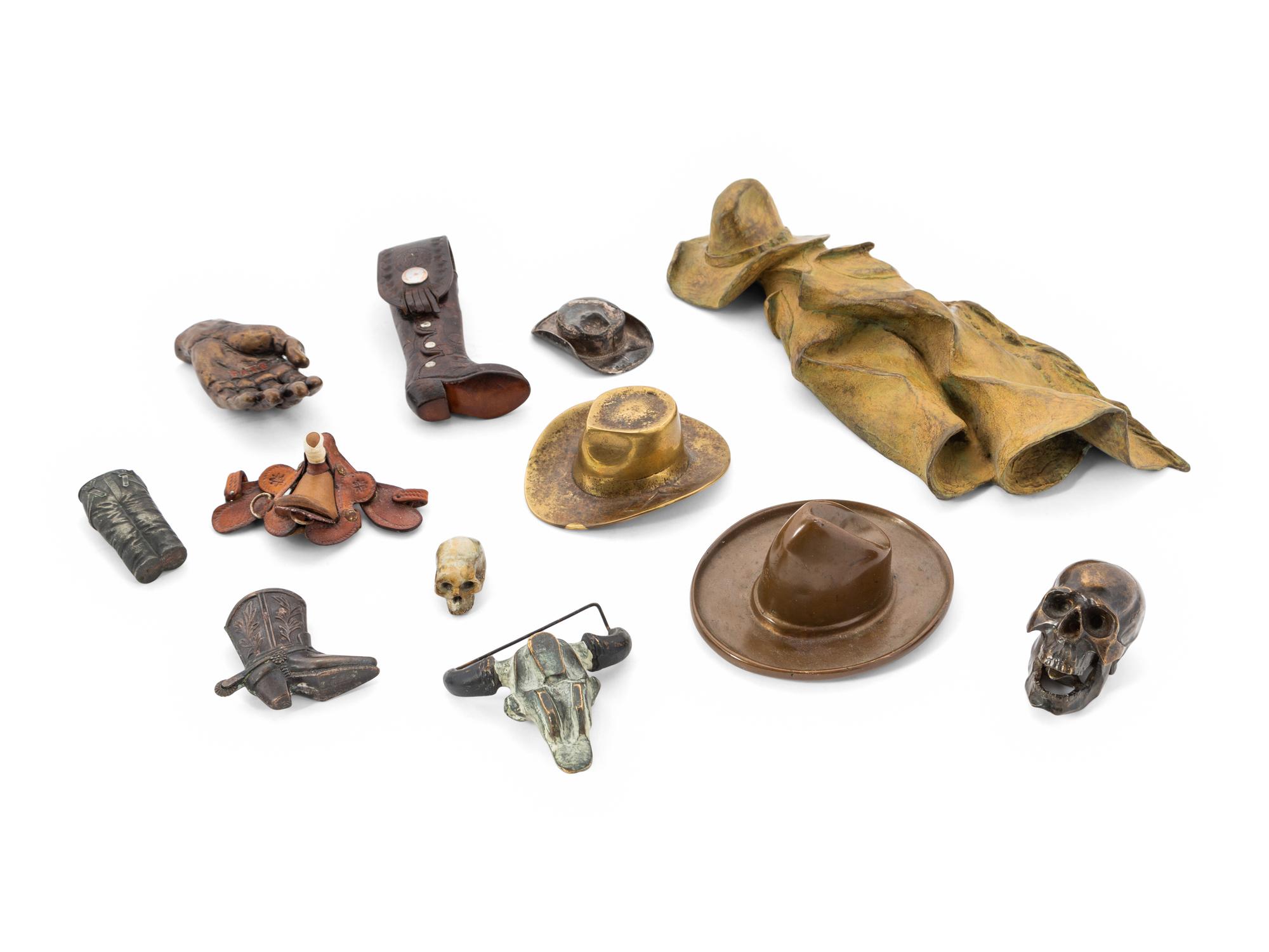A Group of Eleven Miniature Bronze Western Objects