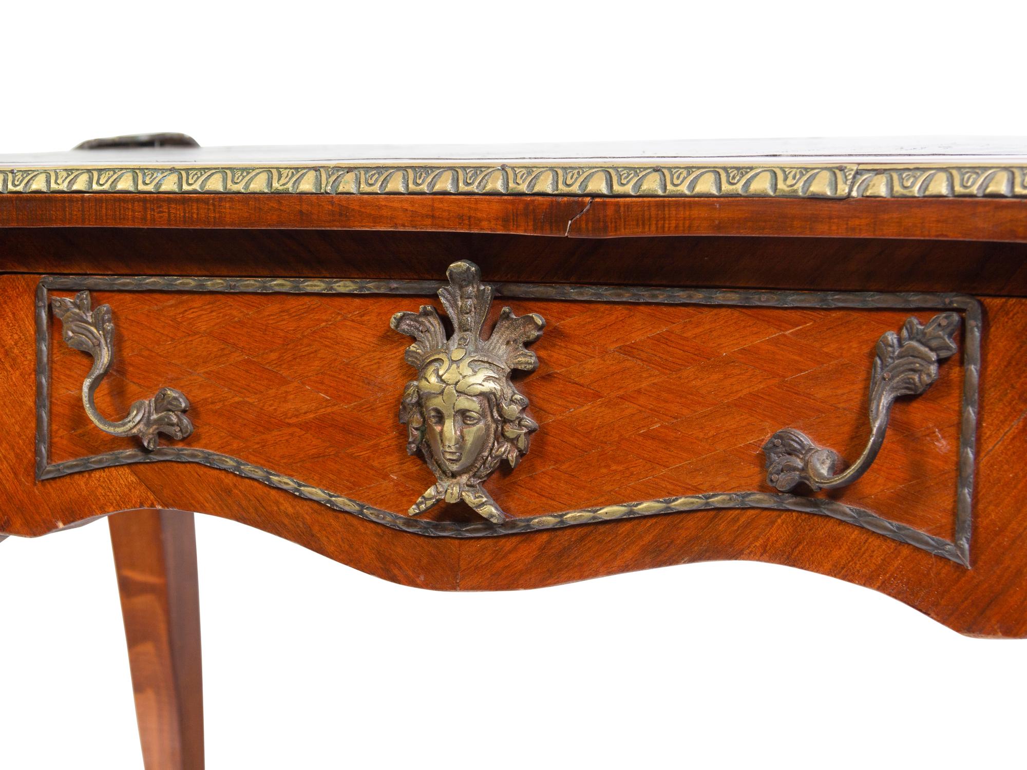 A Louis XV Style Gilt Metal Mounted Walnut Bureau Plat