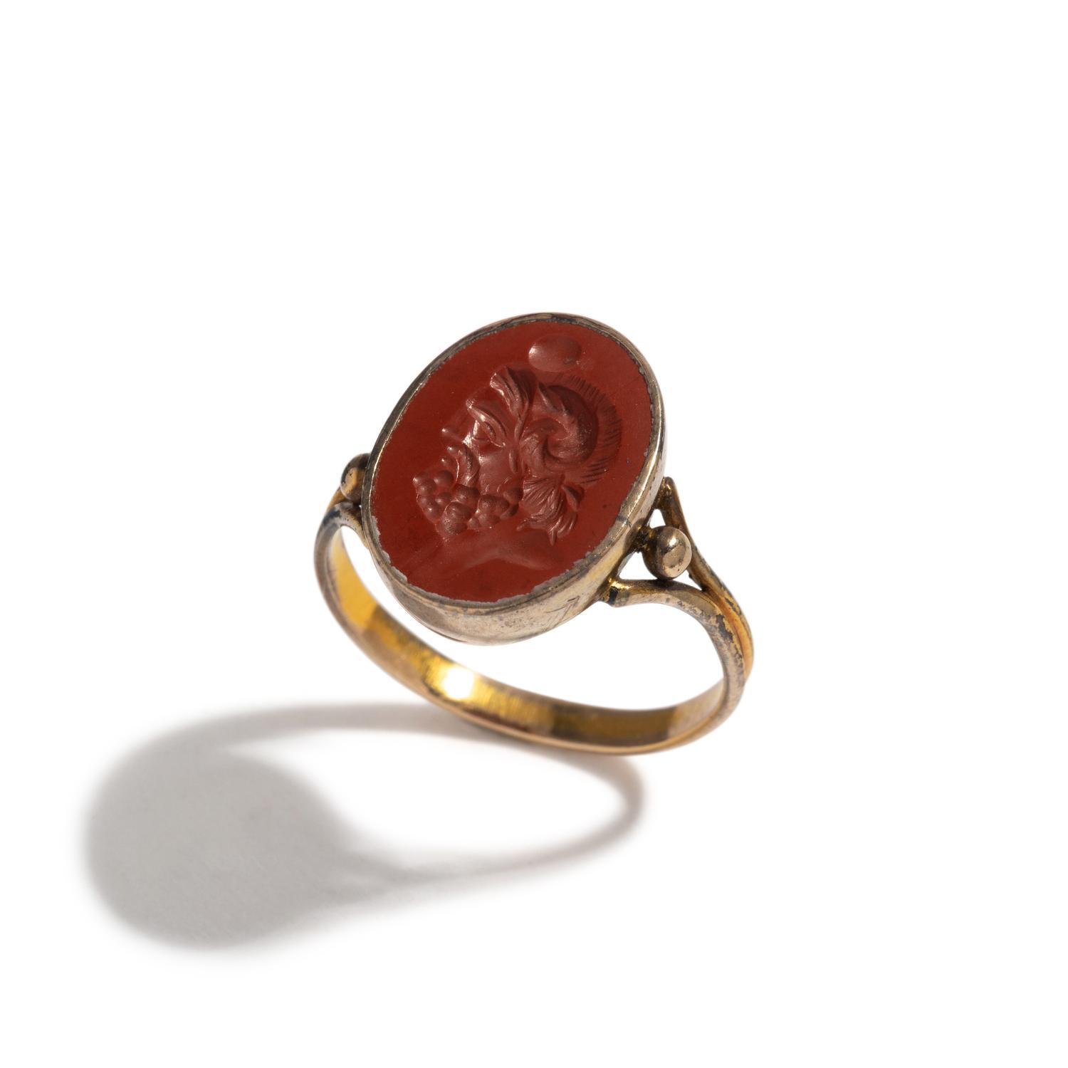 A Roman Red Jasper Ring Stone with the God Zeus Ammon — Set in a brass ring
