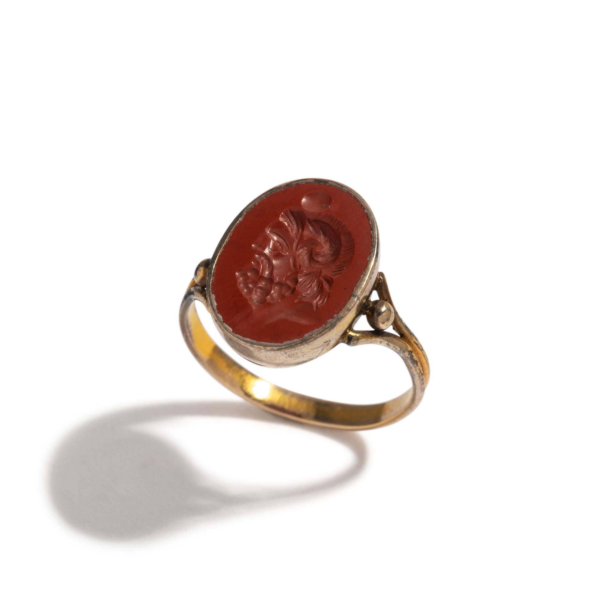 A Roman Red Jasper Ring Stone with the God Zeus Ammon — Set in a brass ring