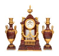 A Louis XVI Style Rouge Marble and Gilt Bronze Clock Garniture