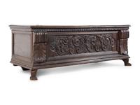 An Italian or Continental Carved Walnut Cassone