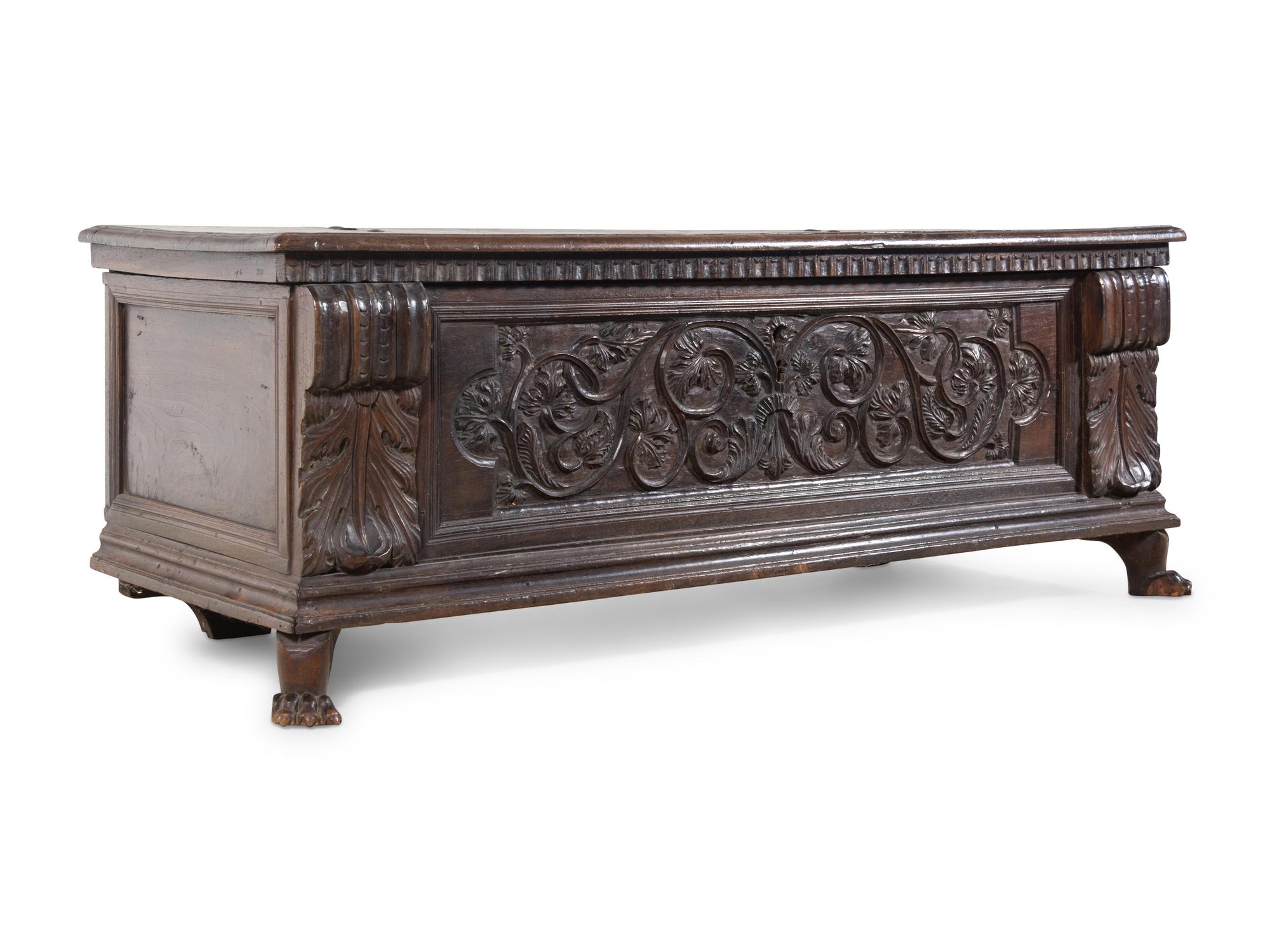 An Italian or Continental Carved Walnut Cassone