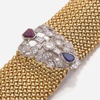 An 18K Yellow Gold, Platinum, and Gemstone Bracelet