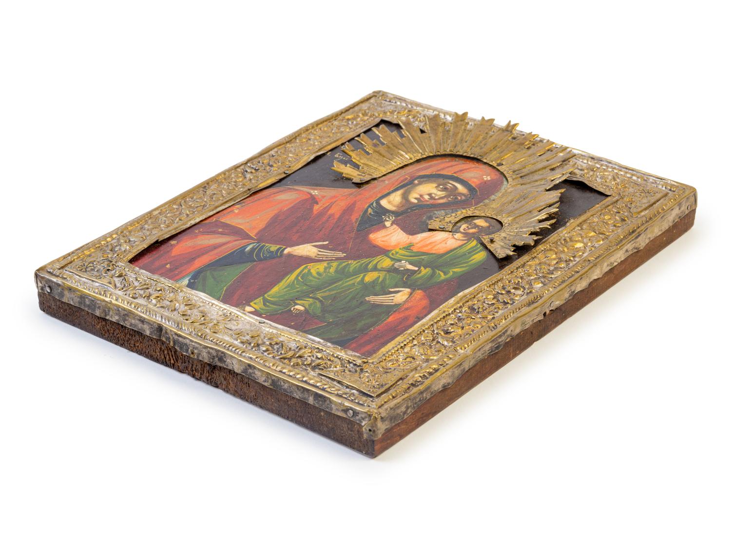 A Continental Brass Mounted Painted Icon