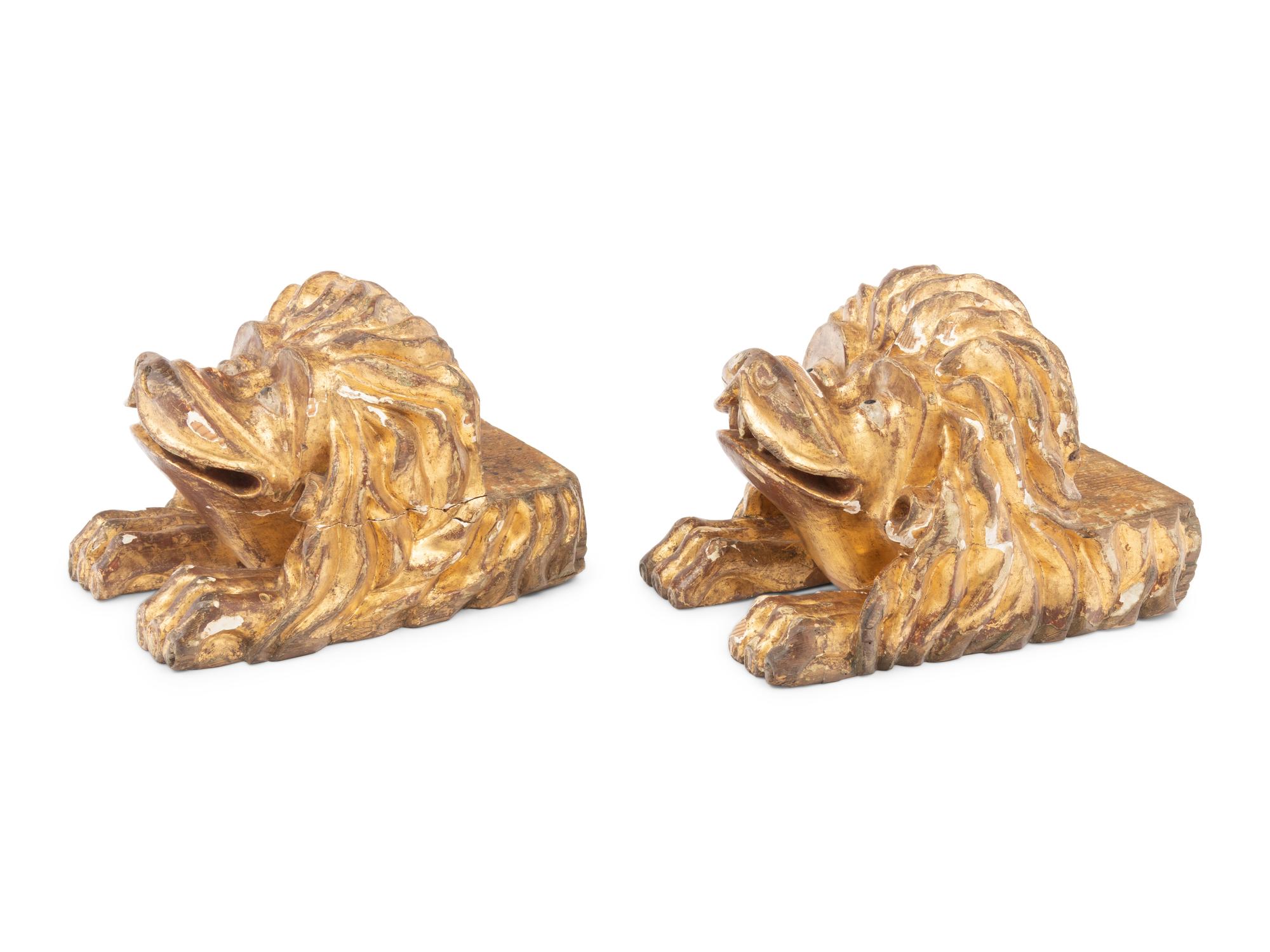 A Pair of Continental Carved Giltwood Lion Wall Brackets