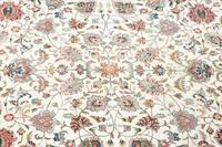 A Tabriz Wool Rug
