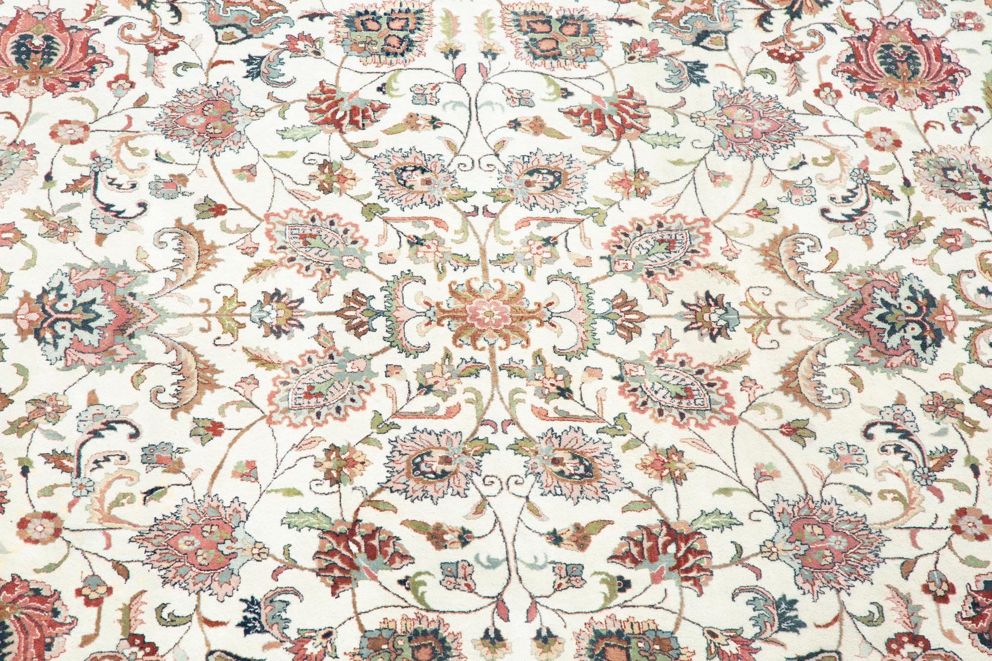 A Tabriz Wool Rug