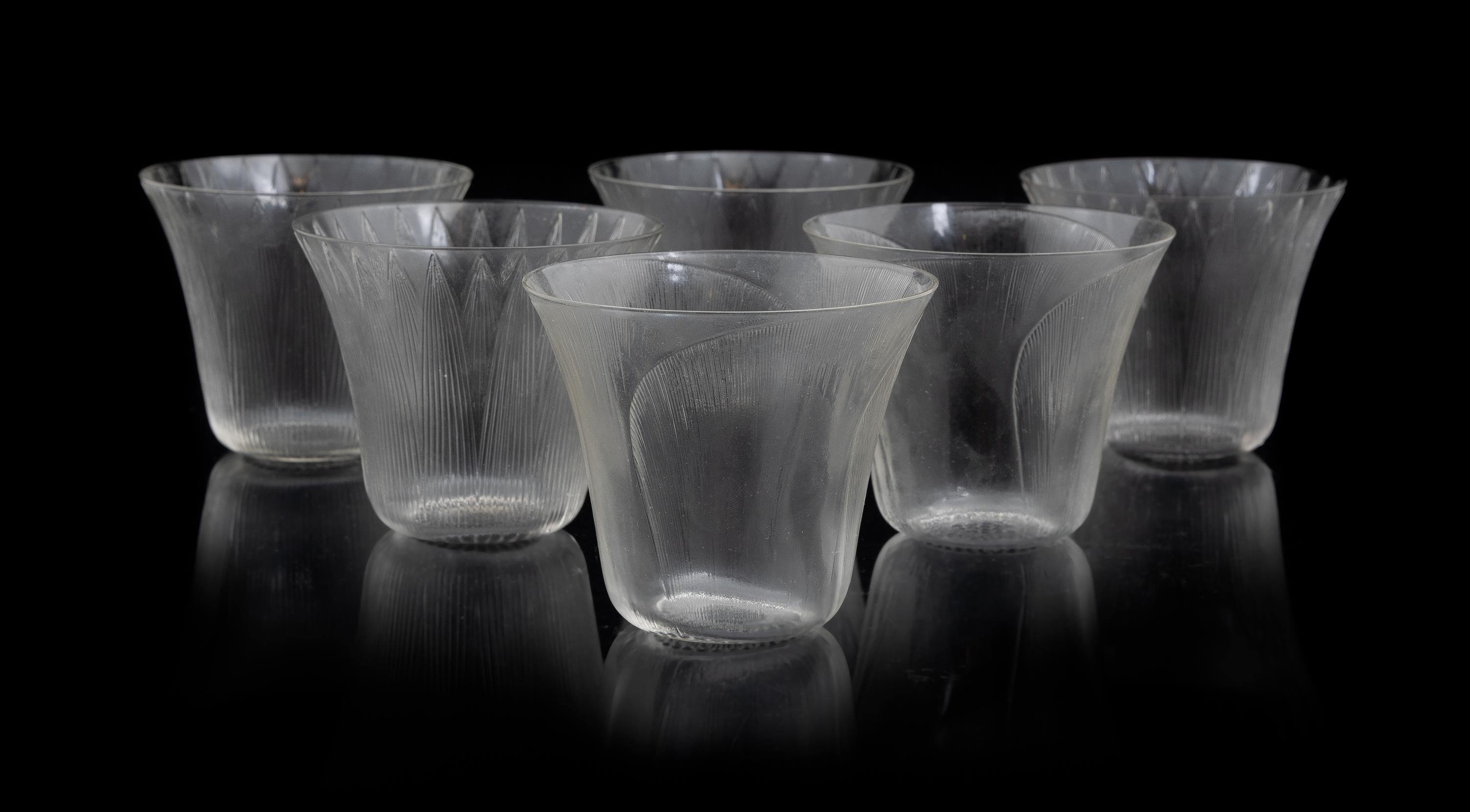 A Set of Six Lalique Molded Glass Tumblers, Pavot Height 3 inches. — MODEL 3407, CIRCA 1922