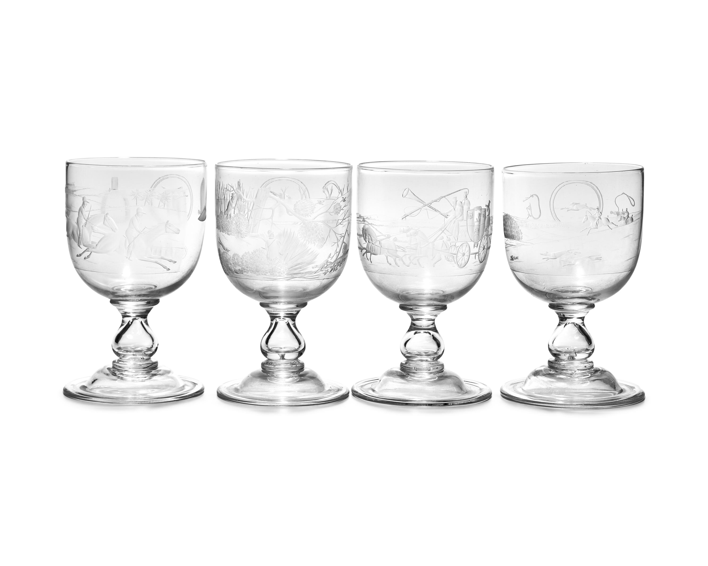 A Set of Seven Blown and Etched Glass Drinking Goblets