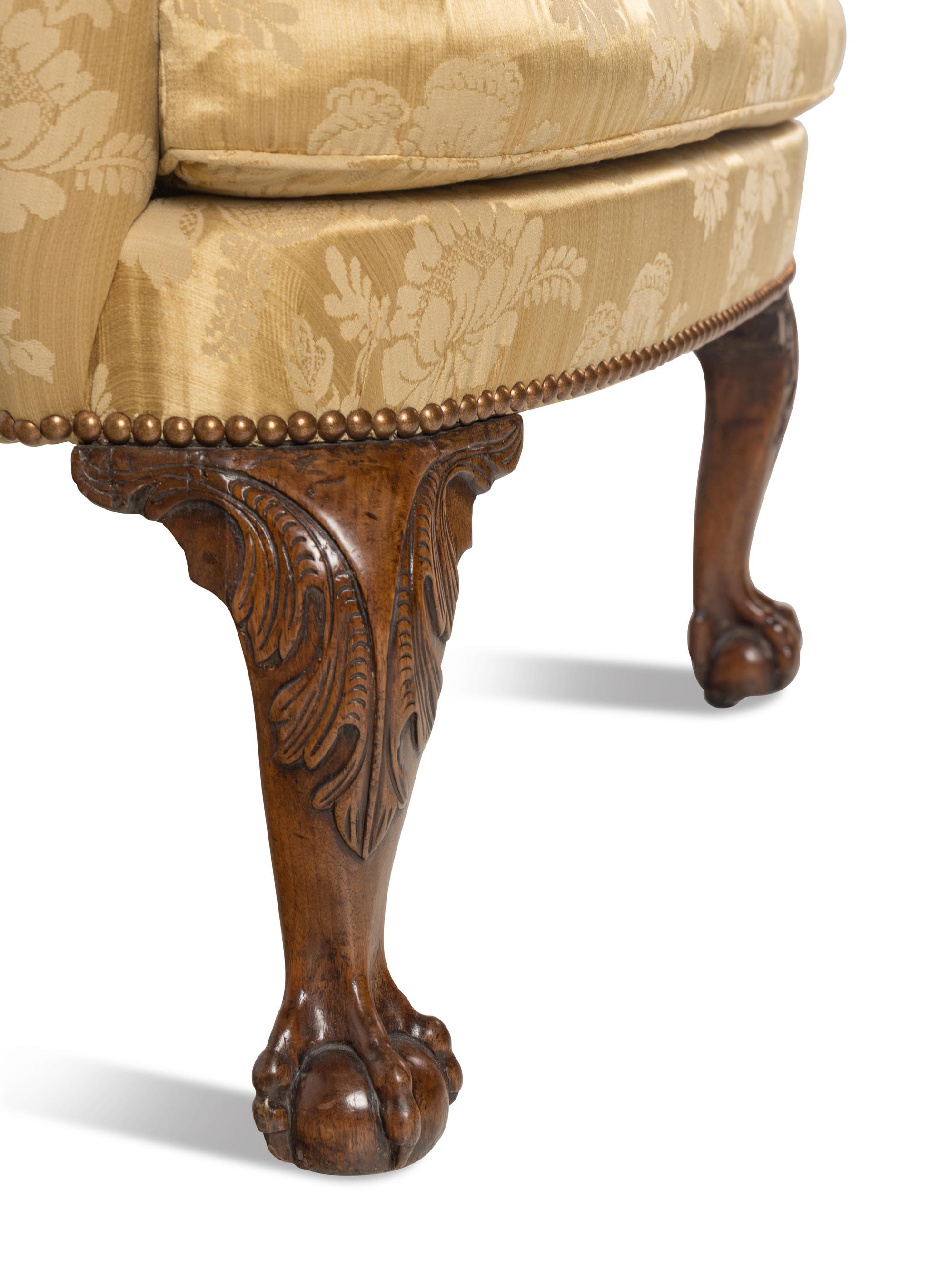 A George II Walnut Wingback Armchair