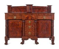 A Late Classical Carved and Highly Figured Mahogany Sideboard