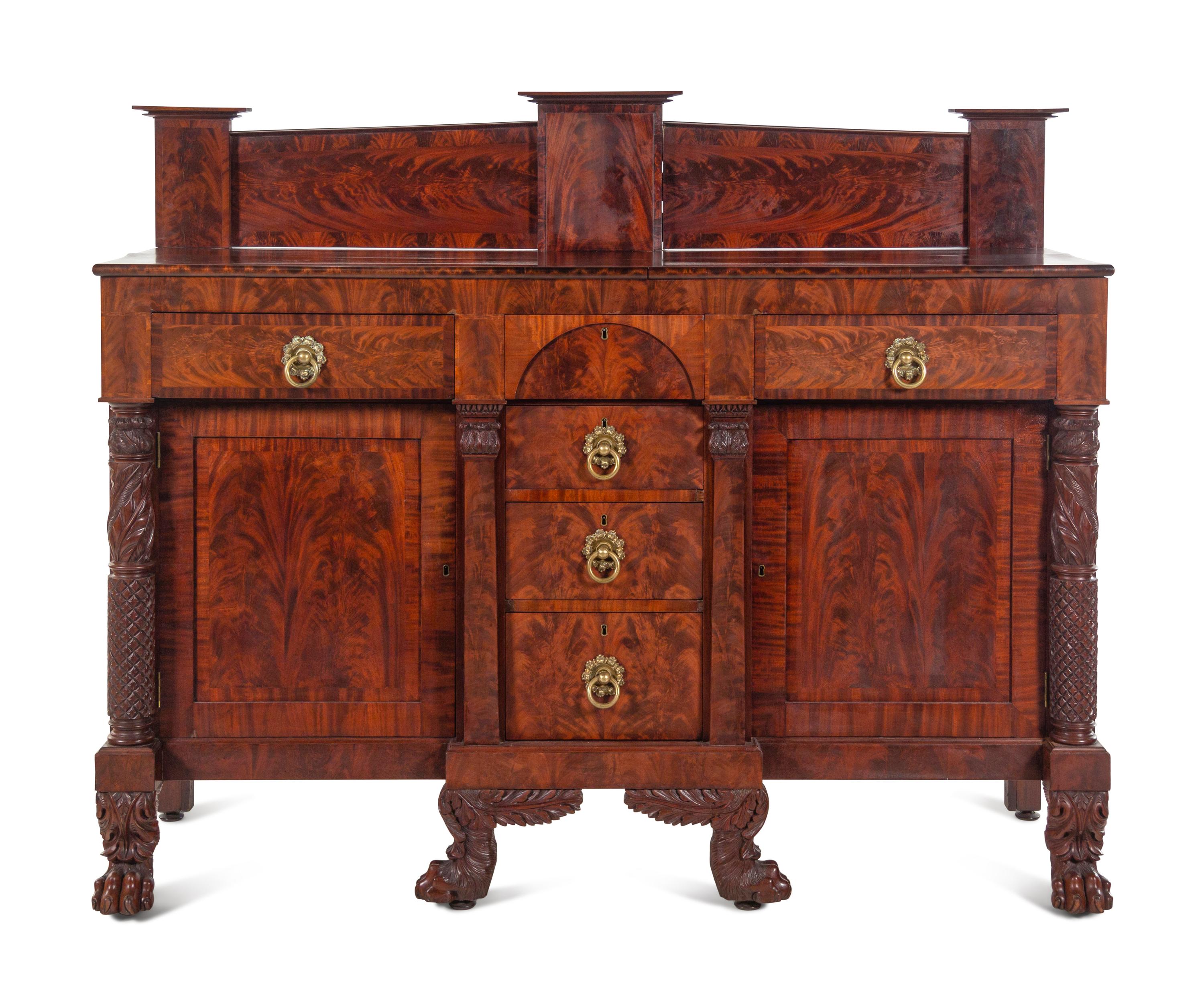 A Late Classical Carved and Highly Figured Mahogany Sideboard