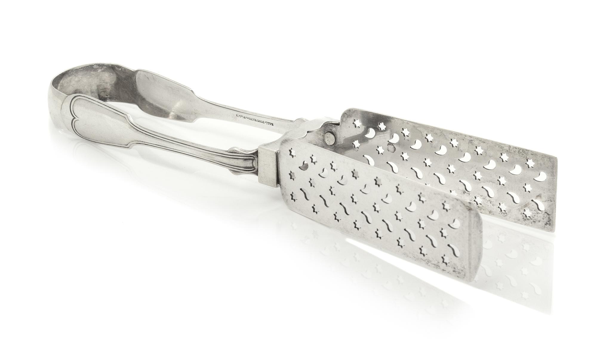 An American Silver Asparagus Tongs, Ball, Tompkins & Black, New York, NY, First Half 19th Century, the pierced tongs with a Fiddle and