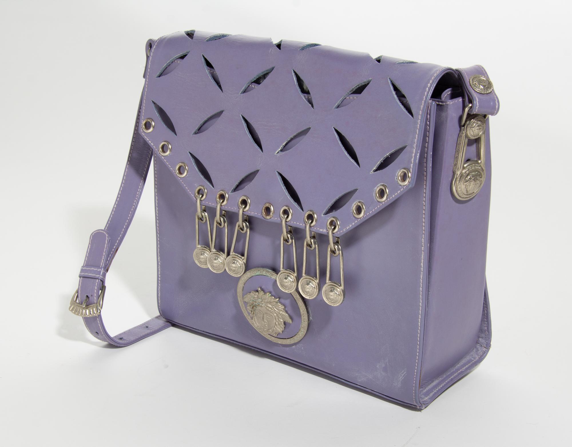 A Gianni Versace Purple Leather Safety Pin Shoulder Bag, 10" x 9.5" x 4"; Strap drop: 11-16".