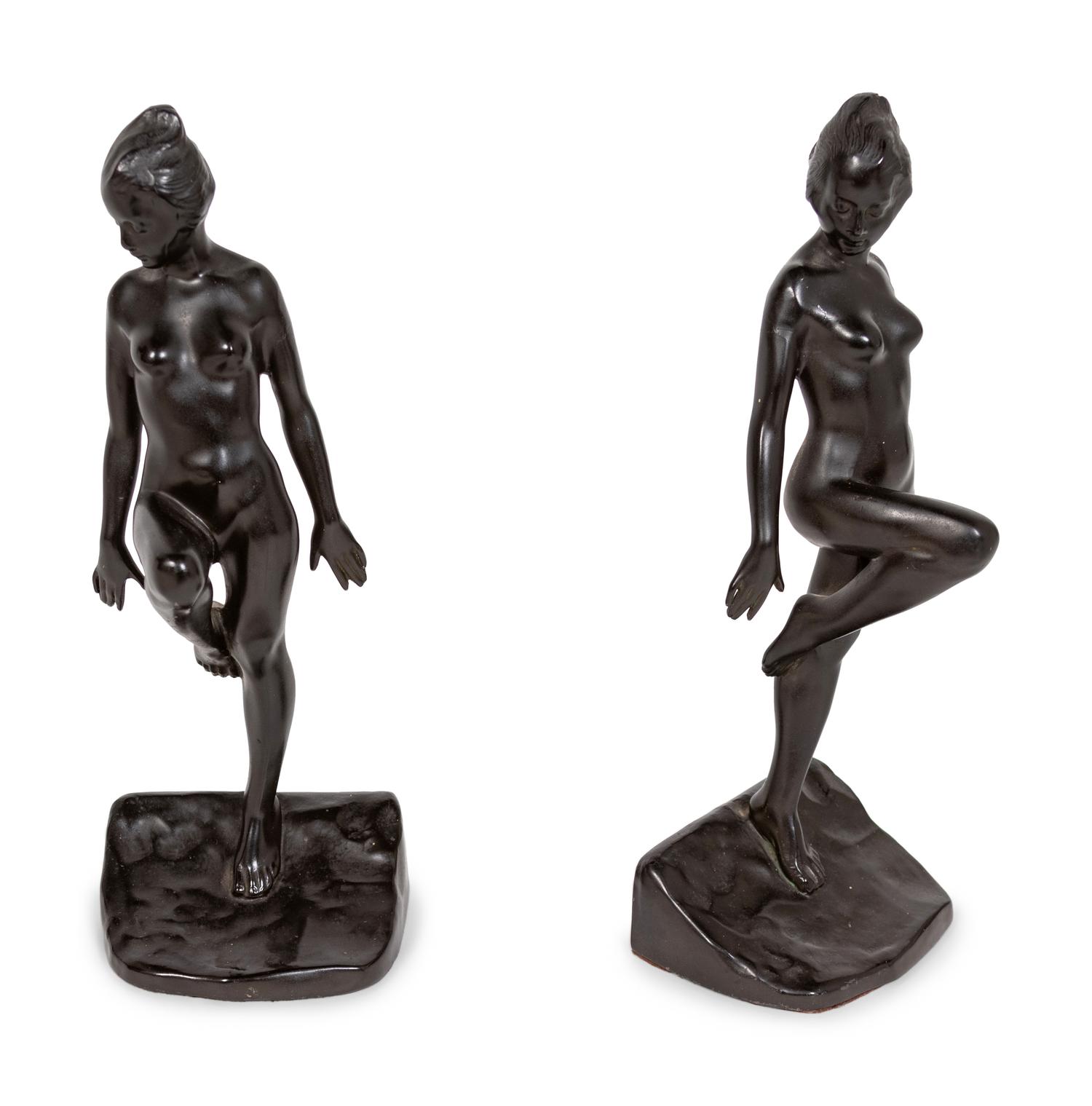 A Pair of Cast Metal Figural Bookends