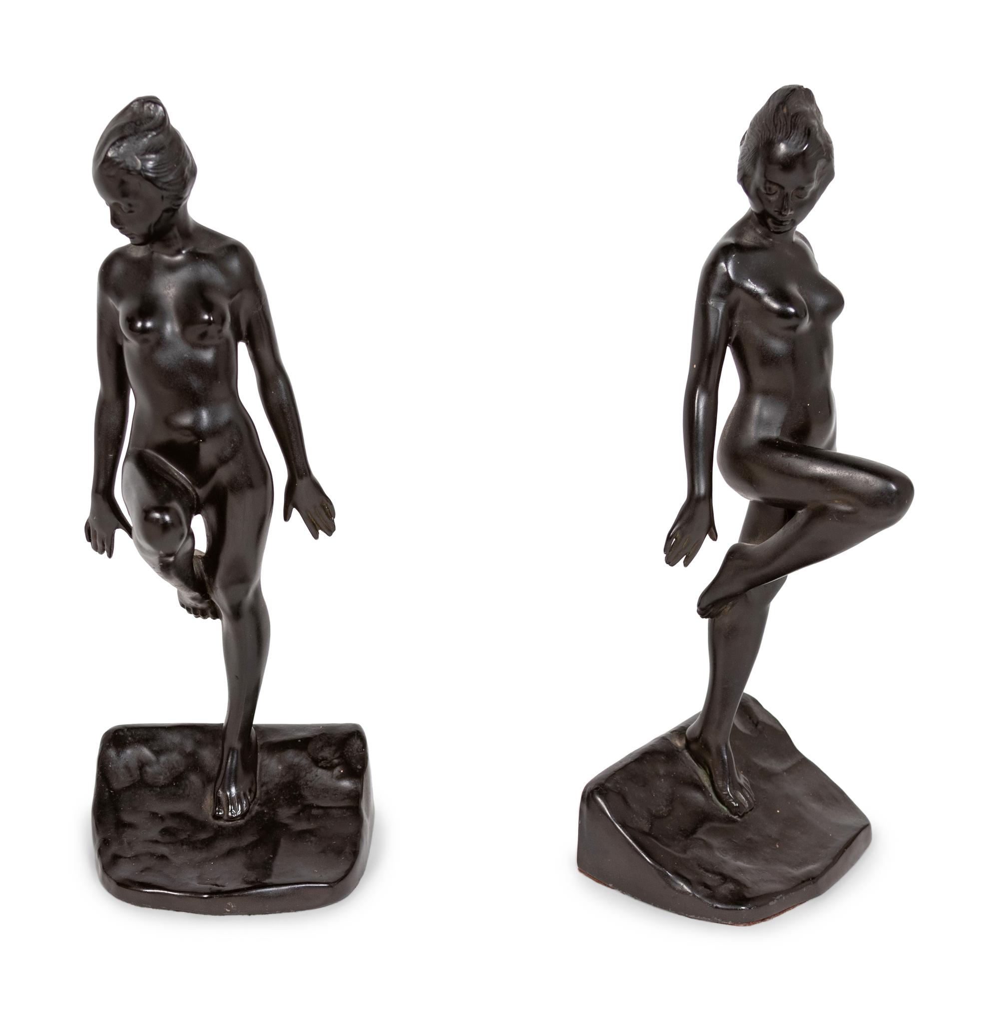 A Pair of Cast Metal Figural Bookends