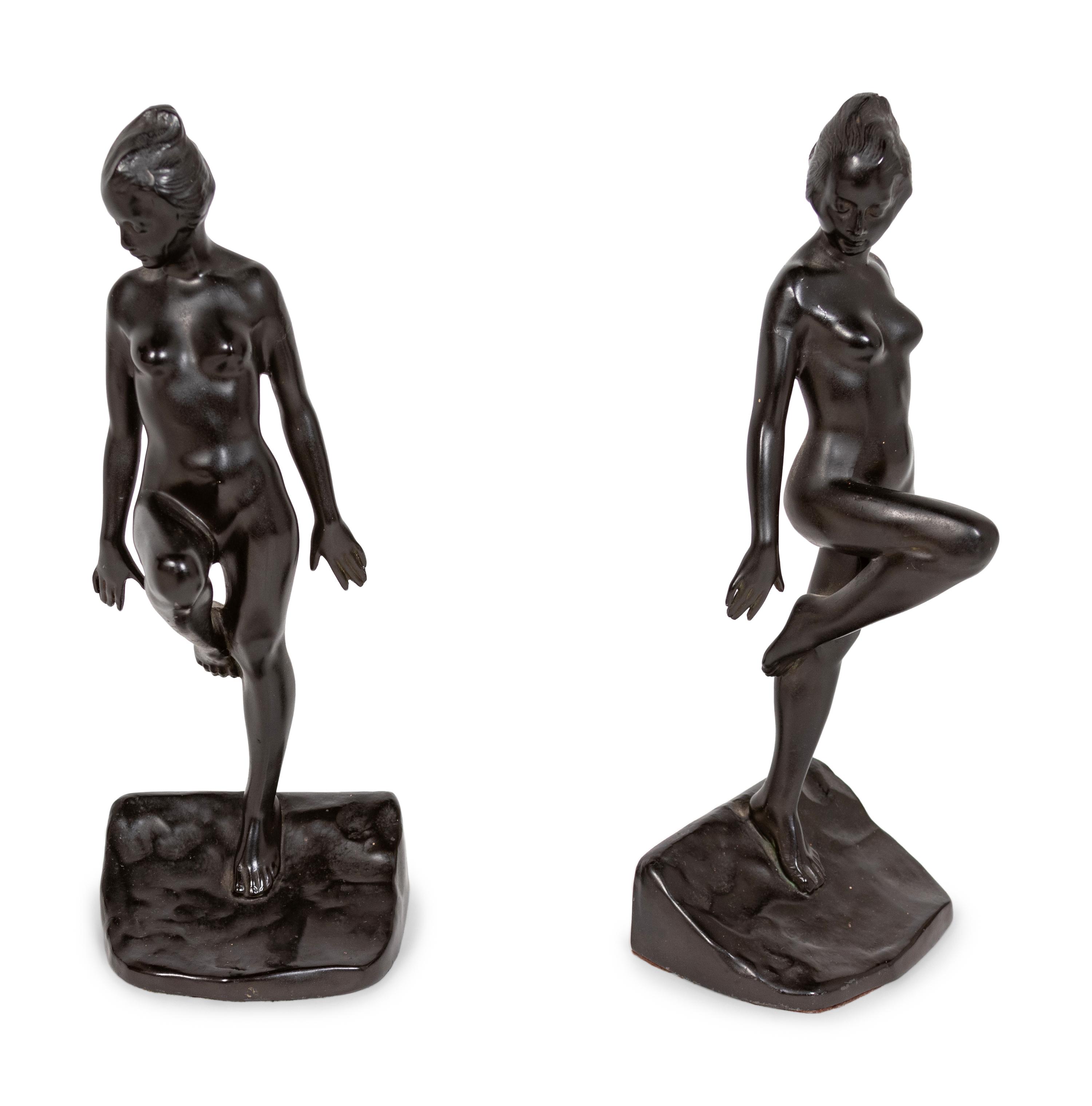 A Pair of Cast Metal Figural Bookends