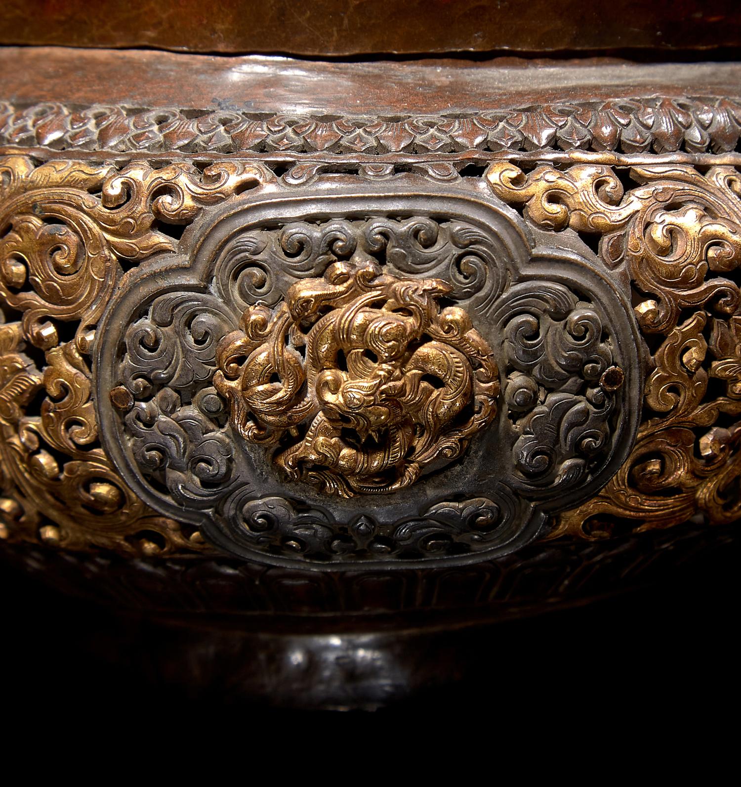 A Tibetan Silver Mounted and Parcel Gilt Copper Reticulated Censer and Cover 西藏嵌銀鎏金銅蓋爐