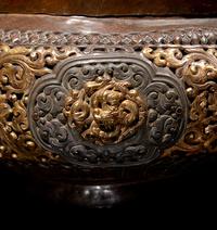 A Tibetan Silver Mounted and Parcel Gilt Copper Reticulated Censer and Cover 西藏嵌銀鎏金銅蓋爐