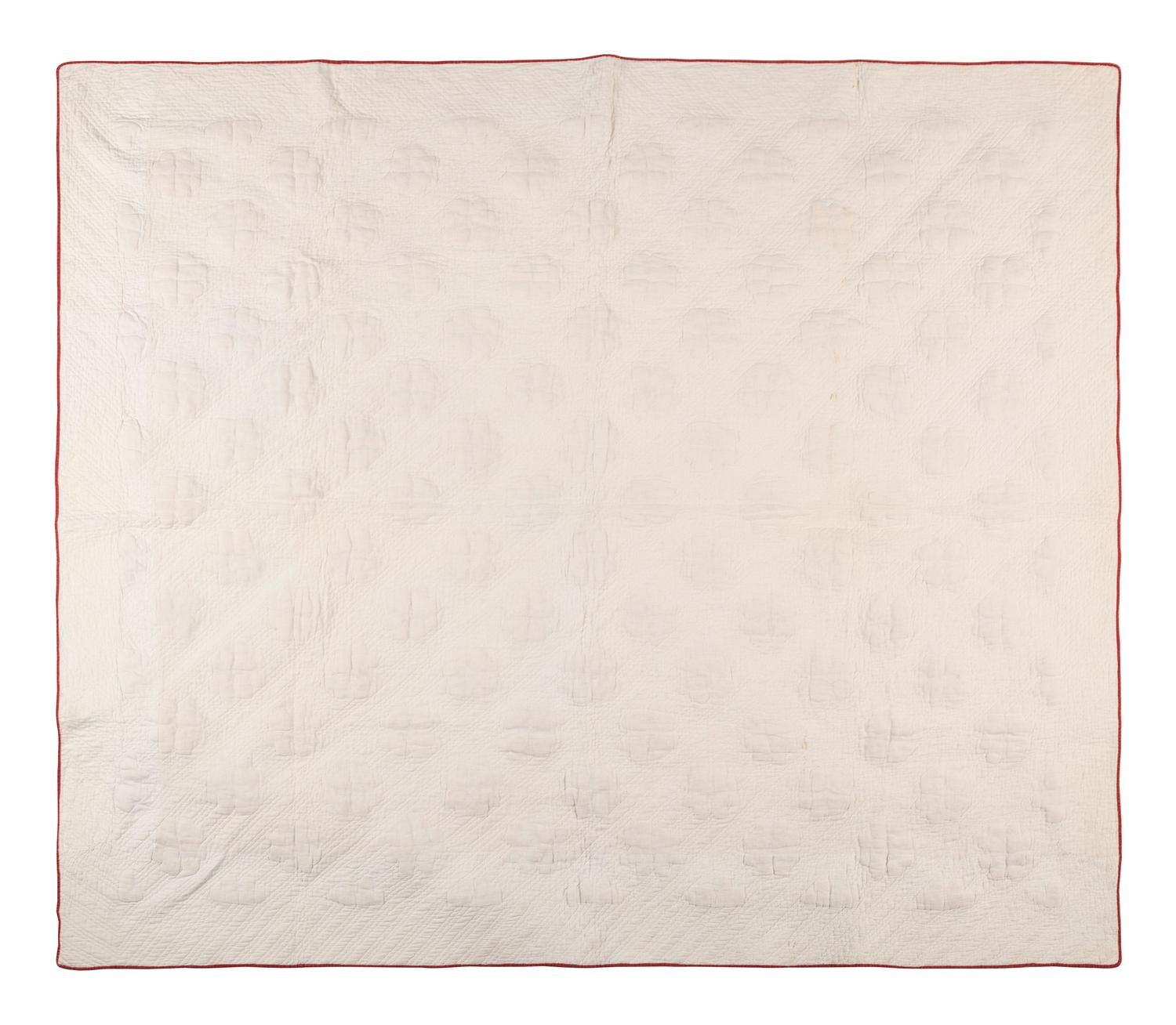 A Trapunto 'Heart' Pattern Cotton Quilt