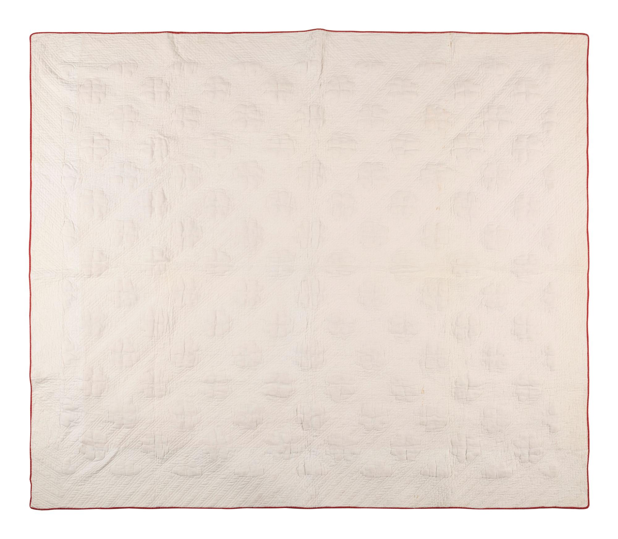 A Trapunto 'Heart' Pattern Cotton Quilt