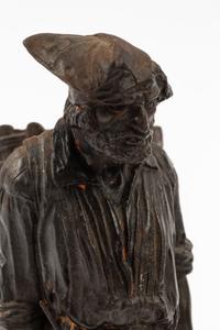 A Pair of Continental Bronze Figures of Peasant Farmers
