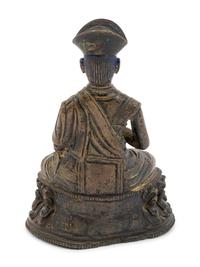 A Tibetan Bronze Figure of a Lama