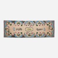 A floral patterned hooked runner 20th century