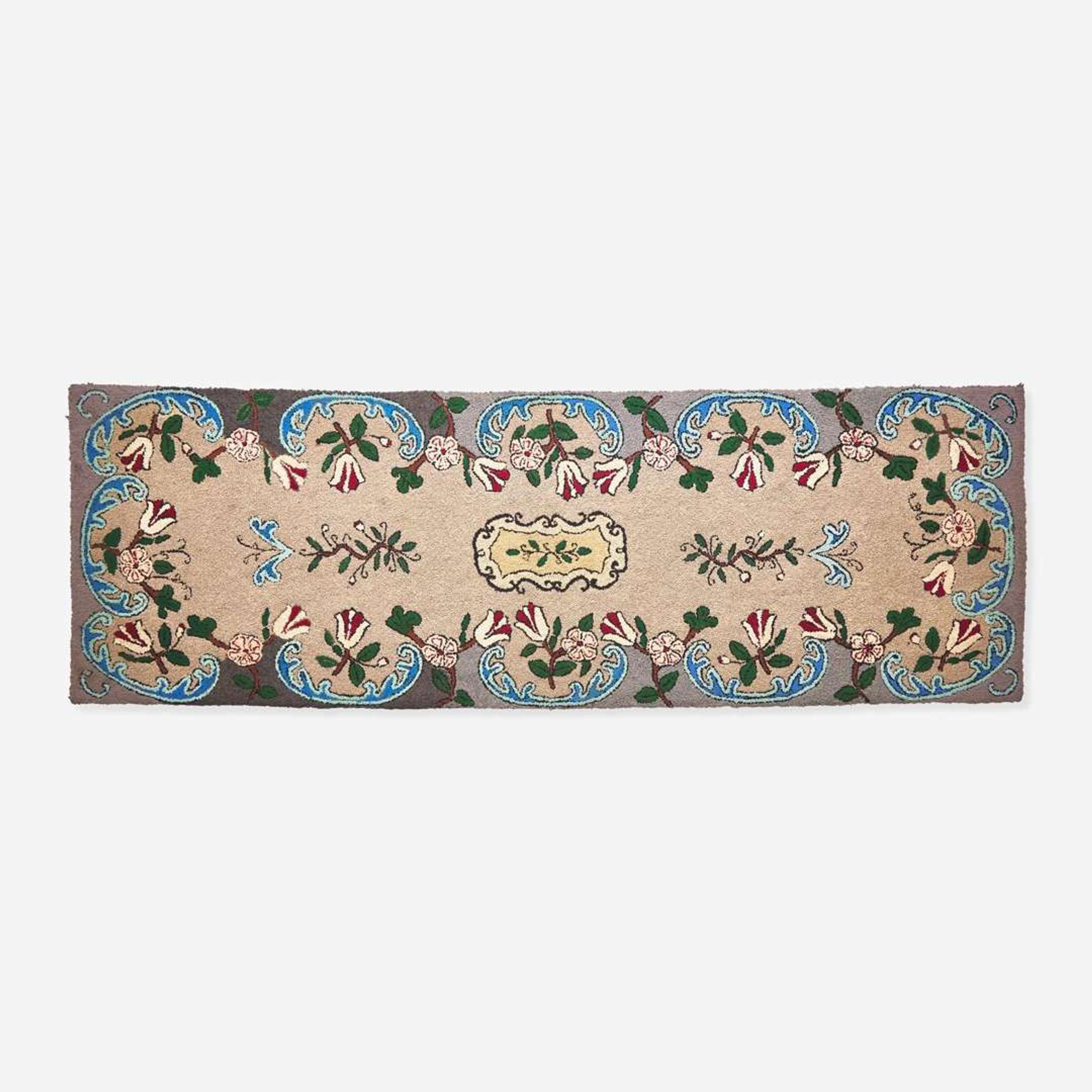 A floral patterned hooked runner 20th century
