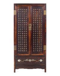 A Chinese Export Jade-Inset Hardwood Cabinet