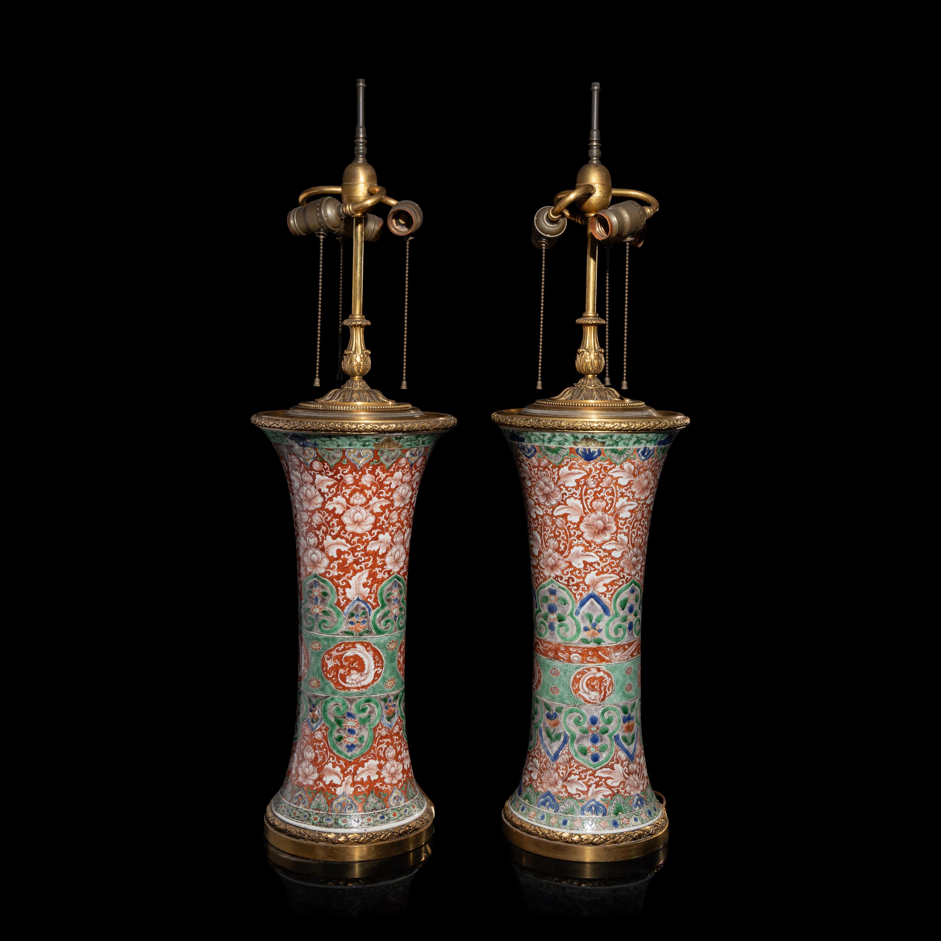 An Associated Pair of Chinese Famille Verte 'Flowers' Porcelain Gu Vases, 18th/19th Century — 清中期 五彩纏枝花卉紋觚一對