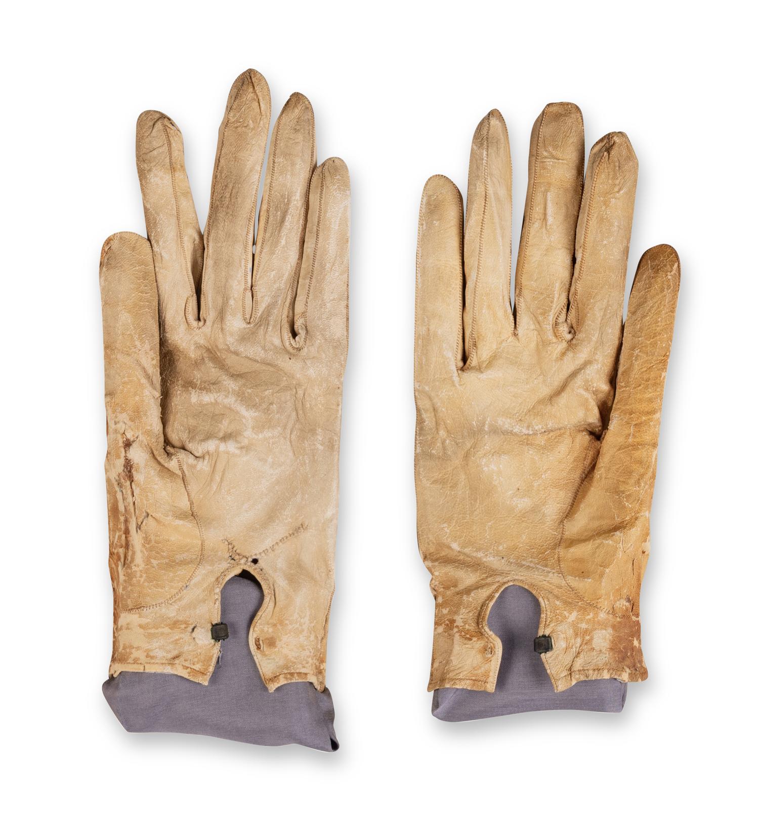 [LINCOLN ASSASSINATION]. A pair of stained leather gloves carried by President Abraham Lincoln at Ford's Theatre on the night of his assassination, 14 April 1865.
