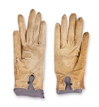 [LINCOLN ASSASSINATION]. A pair of stained leather gloves carried by President Abraham Lincoln at Ford's Theatre on the night of his assassination, 14 April 1865.
