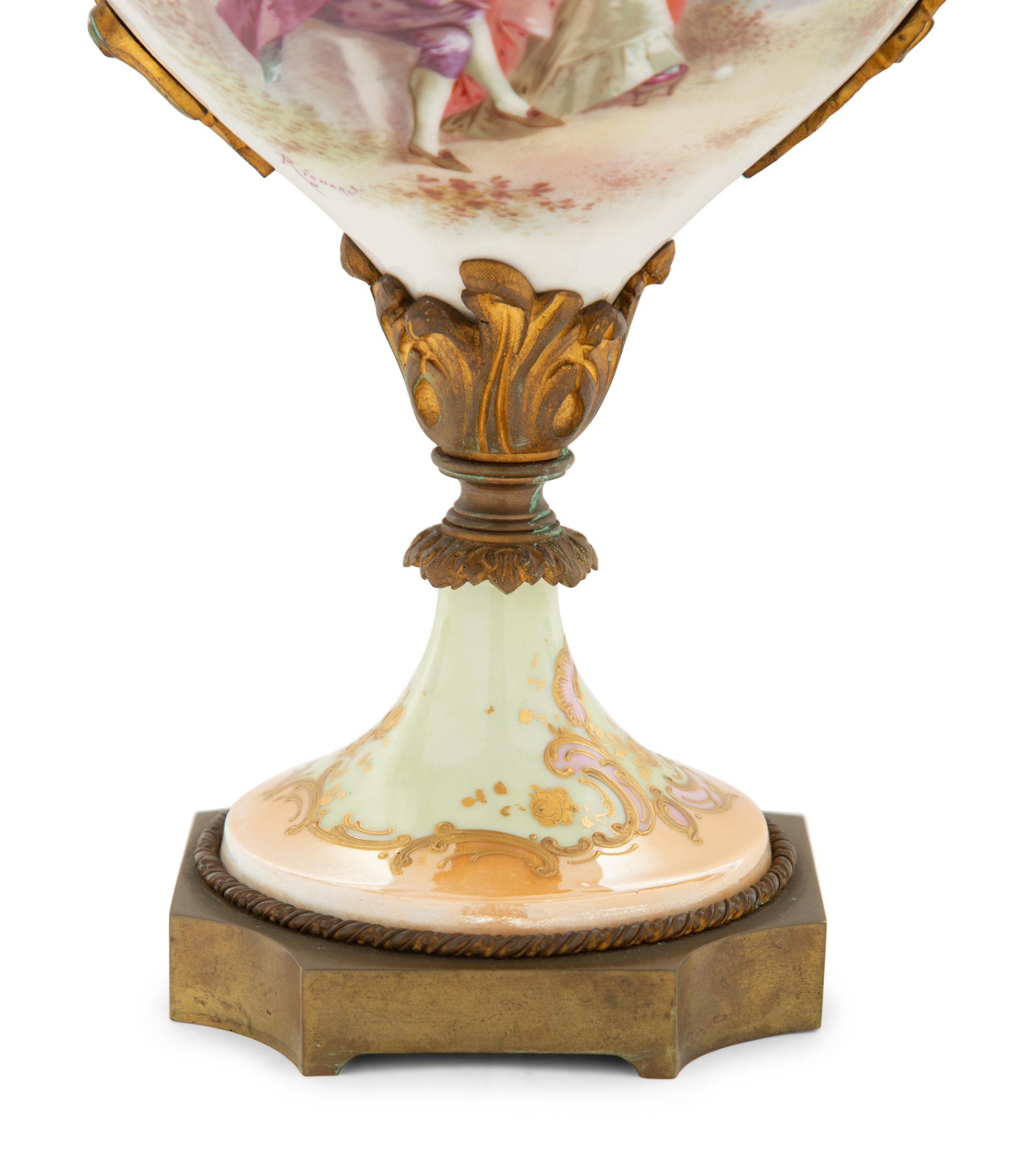 A Gilt Bronze Mounted Sèvres Style Porcelain Urn