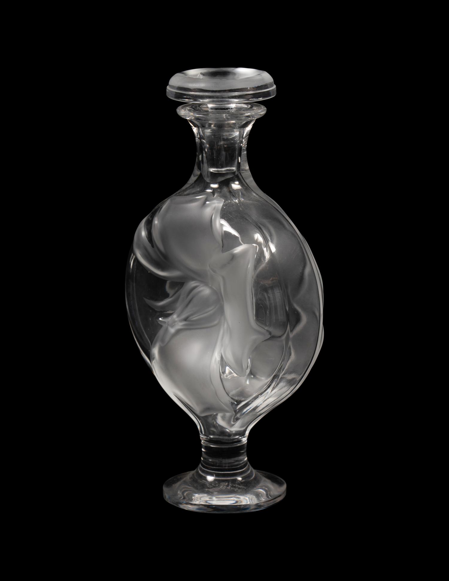 A Group of Four Lalique Dresser Articles