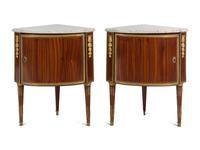 A Pair of Louis XVI Gilt Bronze Mounted Mahogany Marble-Top Encoignures by Charles Topino (French, 1742-1803)