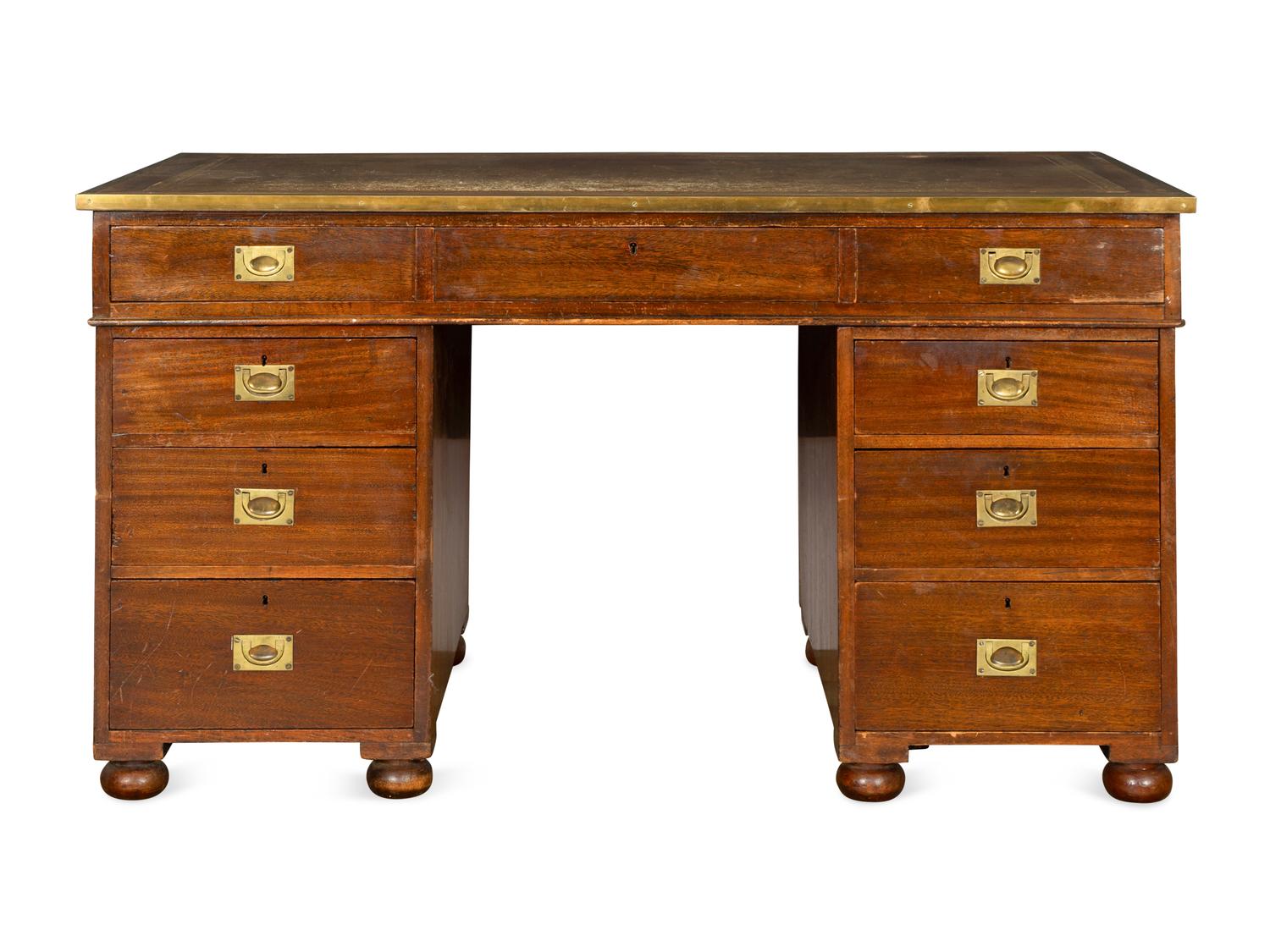 An English Brass Mounted Mahogany Campaign Desk