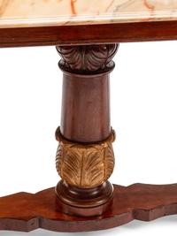 A Northern European Neoclassical Parcel Gilt Mahogany Center Table