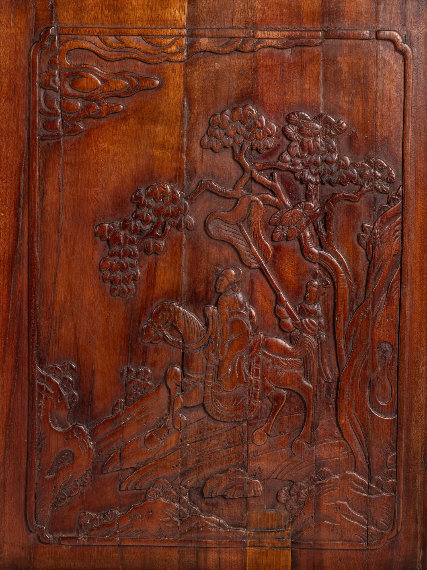 A Set of Four Chinese Softwood Door Panels