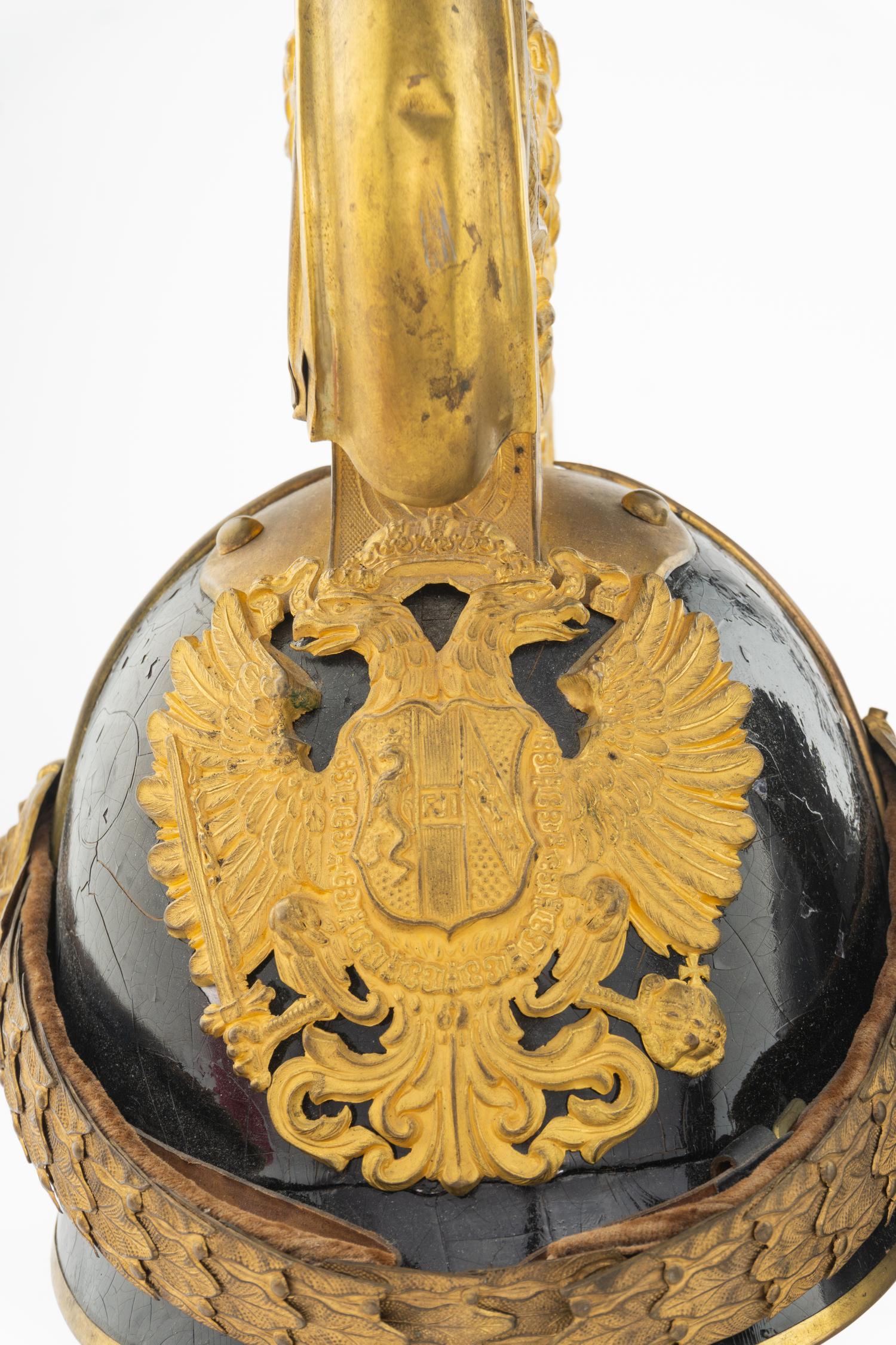 An Austrian Black Lacquer and Gilt Metal WWI Dragoon Helmet Model 1905
