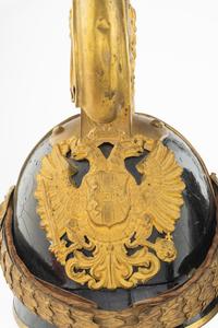 An Austrian Black Lacquer and Gilt Metal WWI Dragoon Helmet Model 1905