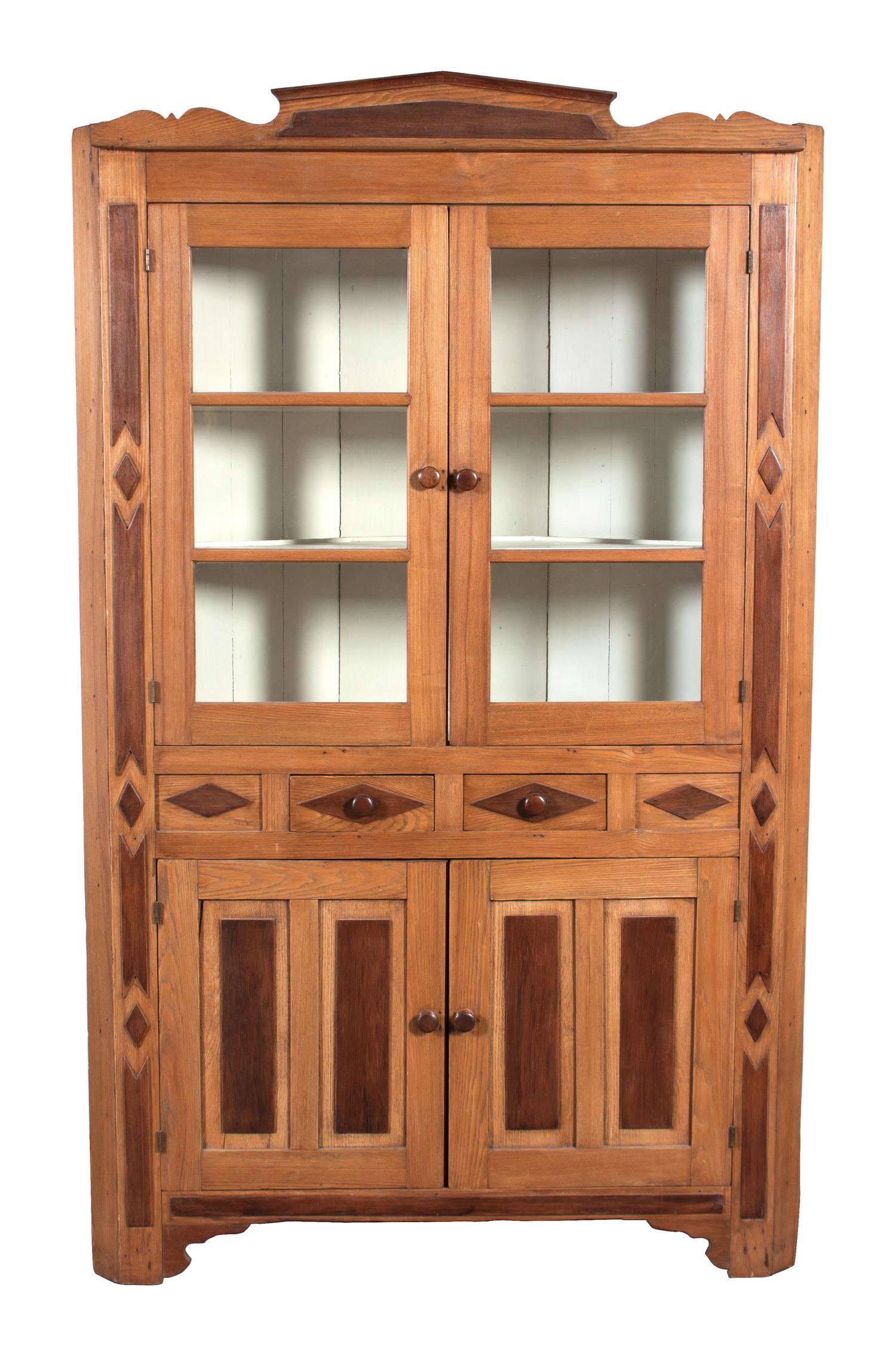 An Inlaid Wood Norwegian Corner Cupboard Height 84 x width 52 x depth 19 inches.