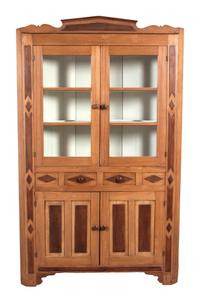An Inlaid Wood Norwegian Corner Cupboard Height 84 x width 52 x depth 19 inches.
