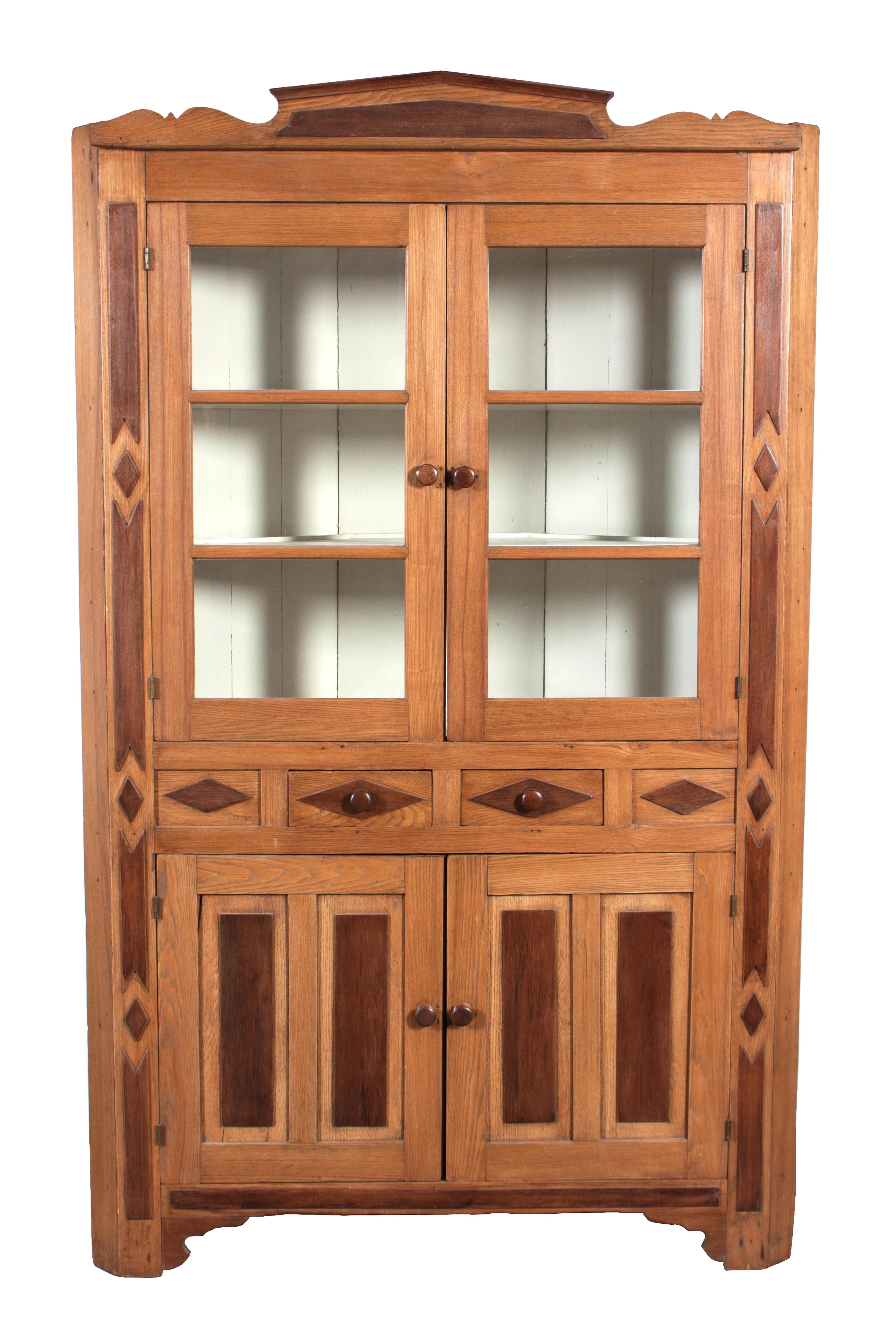 An Inlaid Wood Norwegian Corner Cupboard Height 84 x width 52 x depth 19 inches.